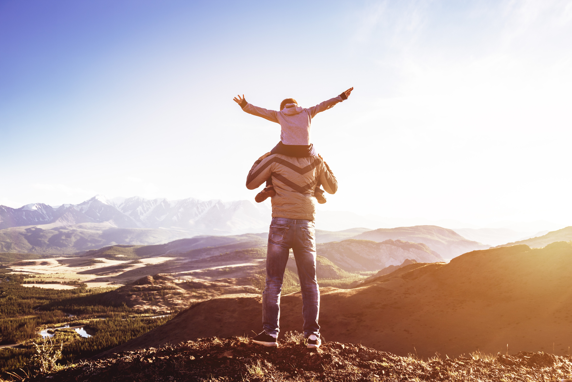 Father son mountains fun travel fatherhood concept