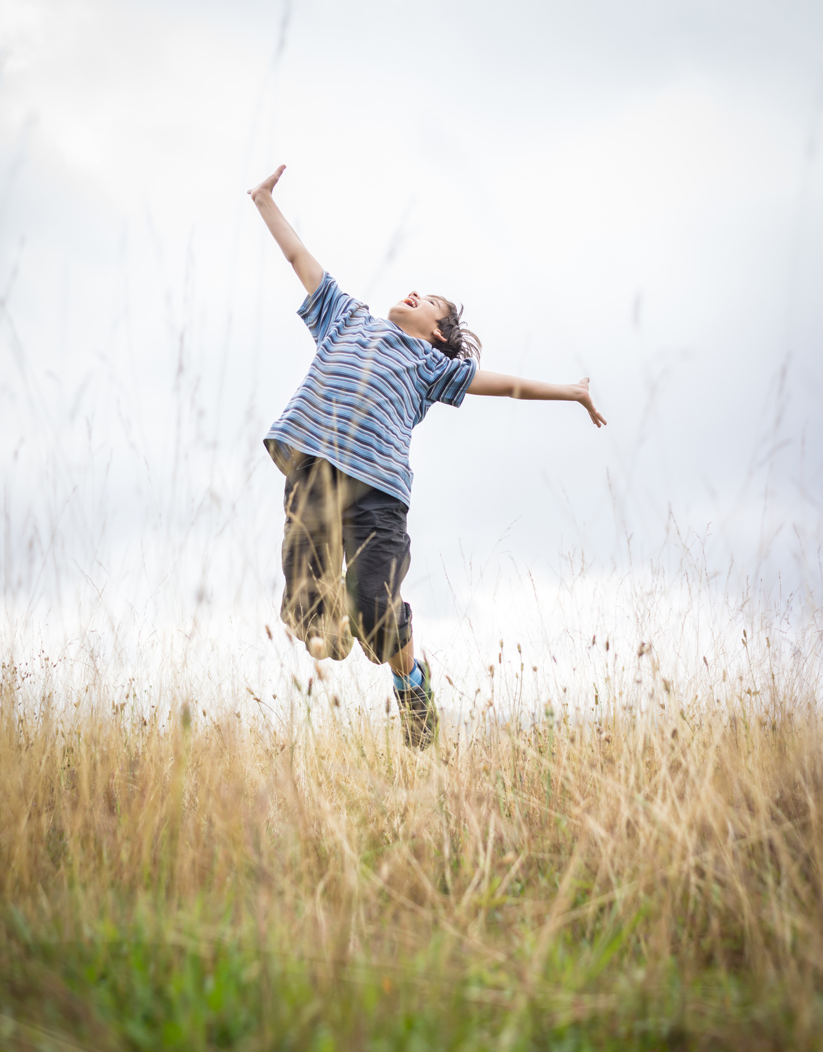 Happy Kid in Nature Enjoying