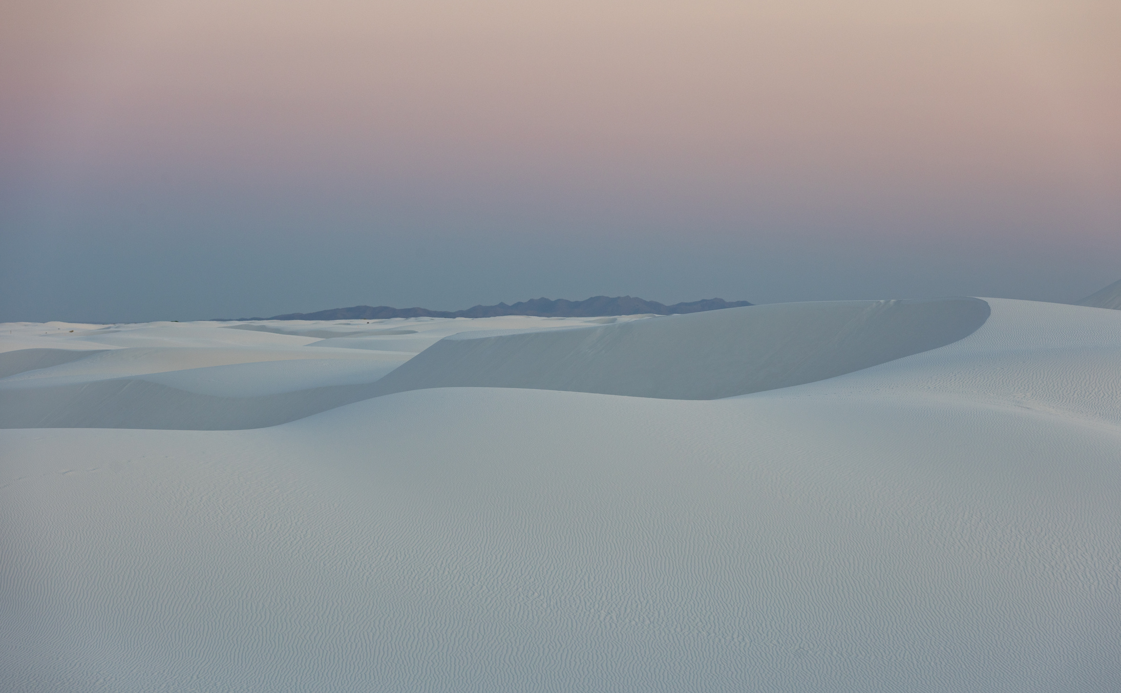 Gypsum sand dunes of White Sands National Park at blue hour